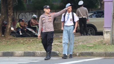 Polresta Tangerang terapkan Program Garda Sigap, anggota polisi wajib atur lalu lintas pagi-sore untuk bantu warga saat jam sibuk.