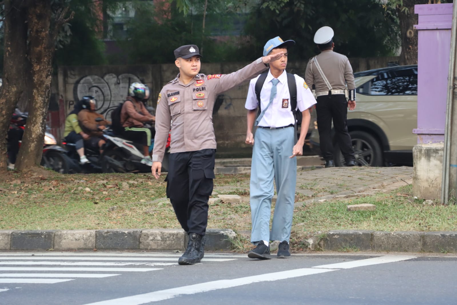 Polresta Tangerang terapkan Program Garda Sigap, anggota polisi wajib atur lalu lintas pagi-sore untuk bantu warga saat jam sibuk.