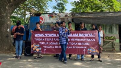 Mahasiswa SOMASI Tangerang gelar demo tolak lahan parkir truk ilegal di Jalan Bayur, desak penutupan permanen demi keselamatan warga.