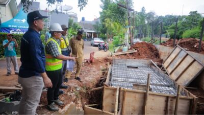 Pemkot Tangsel membangun turap dan ground tank di Serpong Green Park untuk mencegah banjir dan longsor saat hujan ekstrem.