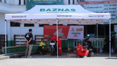 BAZNAS Kota Tangerang adakan ganti oli gratis dan cek kendaraan bagi pemudik motor agar tetap aman di perjalanan.