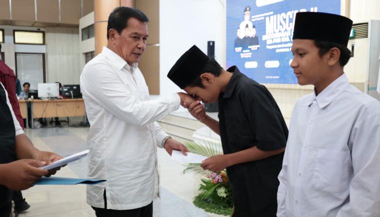 Bupati Tangerang mengapresiasi santunan anak yatim dalam Muscab IKA PMII sebagai bentuk kepedulian sosial dan pengabdian masyarakat.