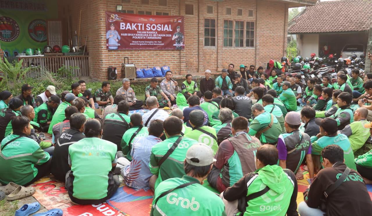 Kapolresta Tangerang ajak ojol jadi mitra informasi kamtibmas, perkuat sinergi Polri dan masyarakat lewat baksos di Panongan.